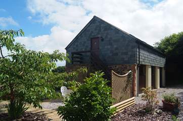 The Hayloft is an unexpectedly spacious first floor apartment.