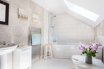 There is a bath and fitted shower above, perfect for long soaks or quick splashes!