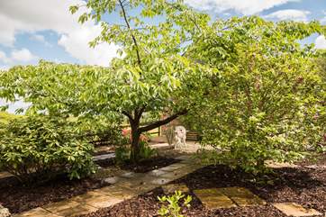 Greenery surrounds the apartment.