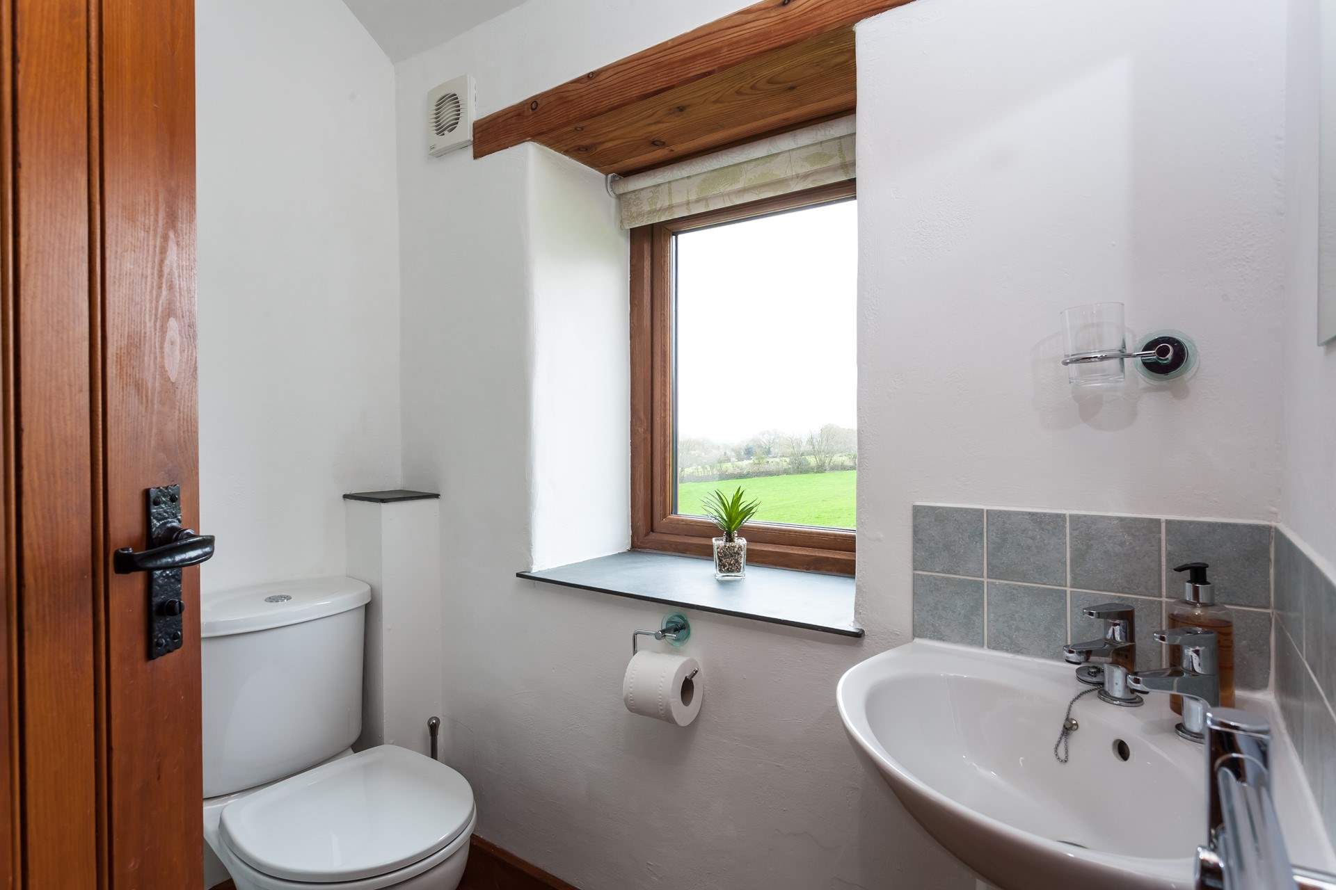 The en-suite shower room for bedroom 3 has a lovely outlook. 