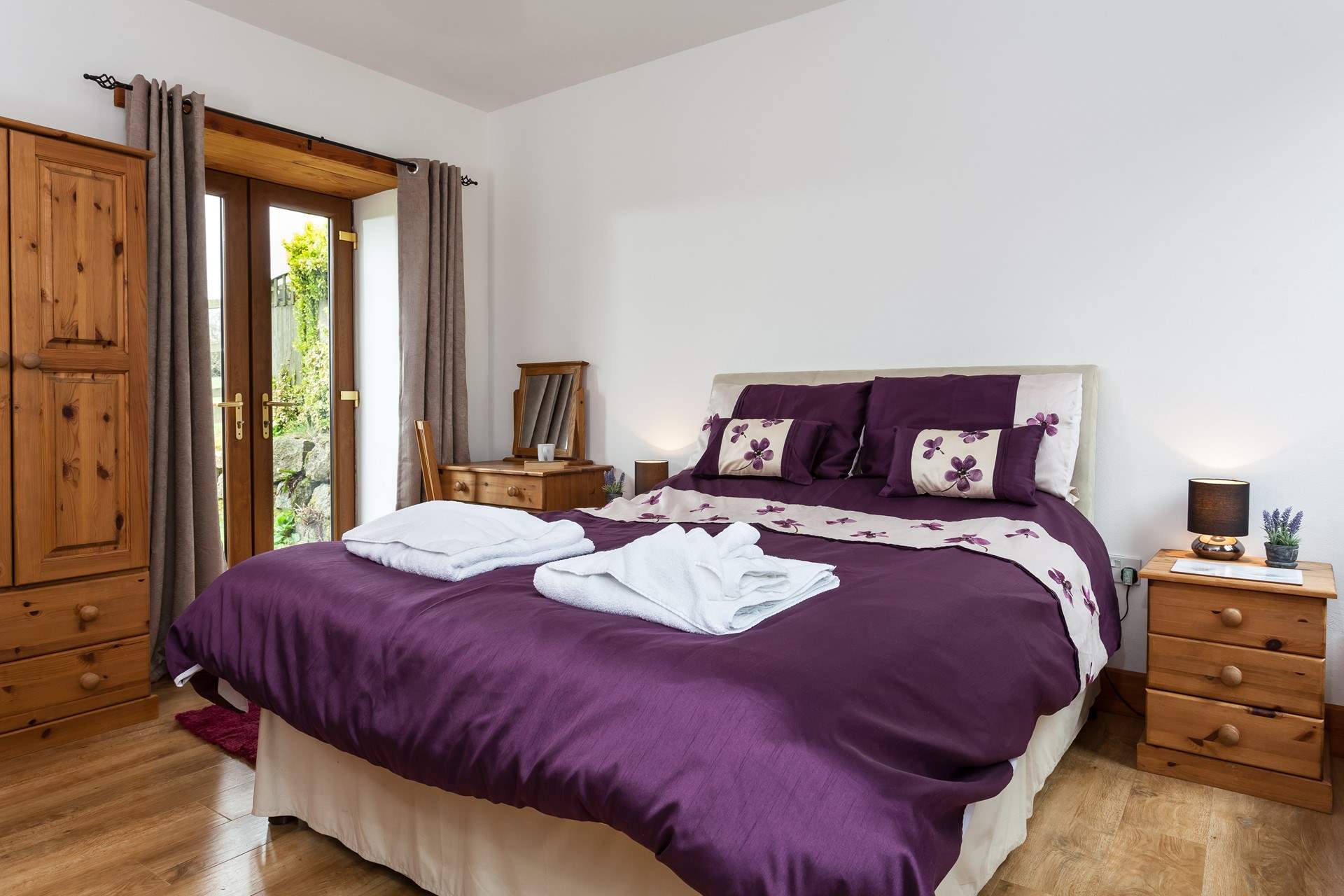 Bedroom 1 on the ground floor over looks the garden and has an en-suite bathroom. 