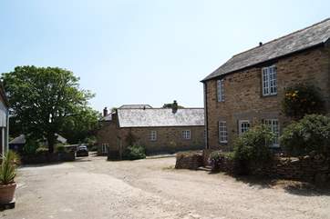 Smugglers Cottage nestles quietly beside a handful of similar cottages at the end of a private unmade lane.