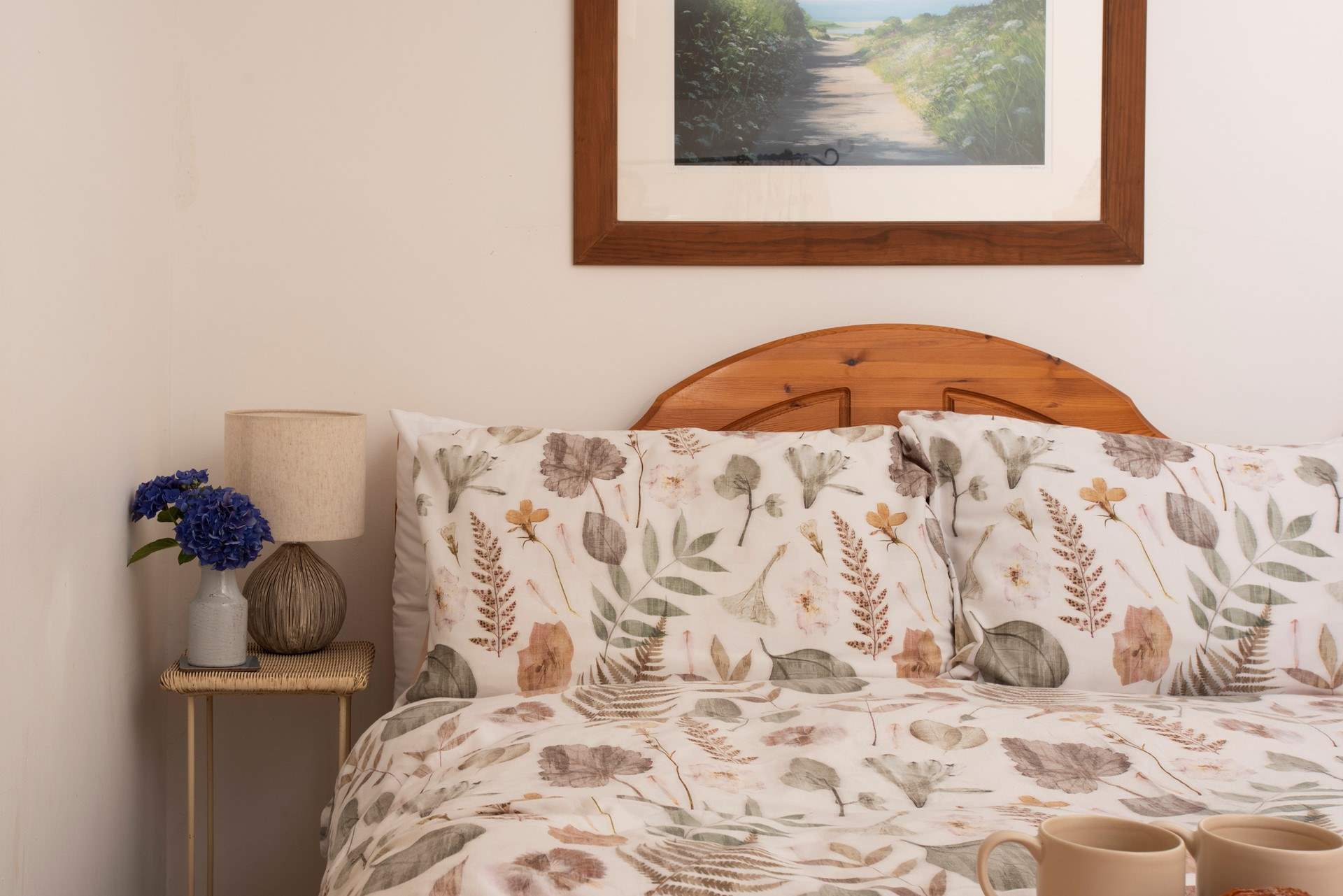 The comfortable bed, perfect for slow mornings.