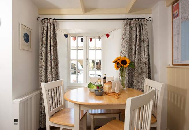 The dining area is ideal for two plus a guest.
