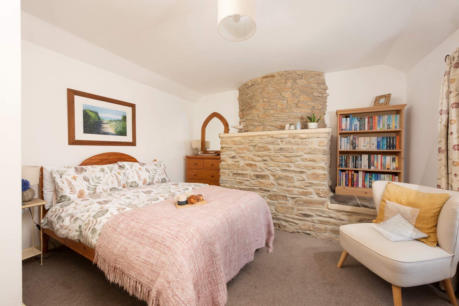The bedroom is comfortable and spacious.