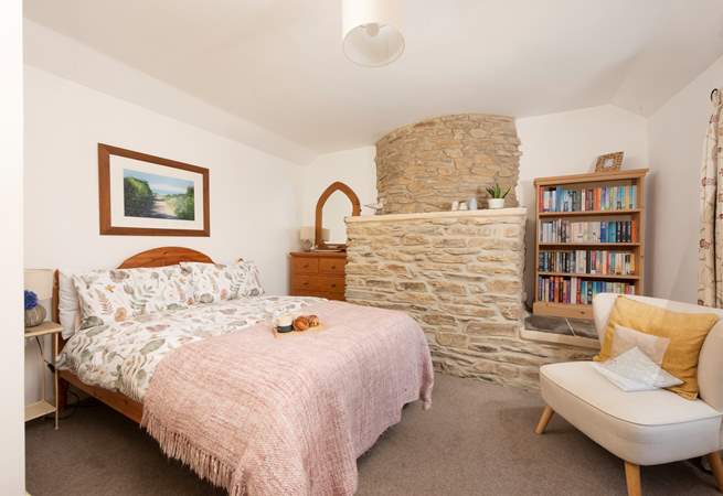 The bedroom is comfortable and spacious.