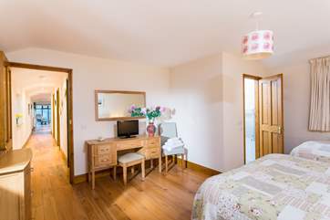 The family bedroom with an en suite shower-room on the right-hand side.