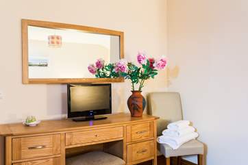 A TV and plenty of storage in the family bedroom.