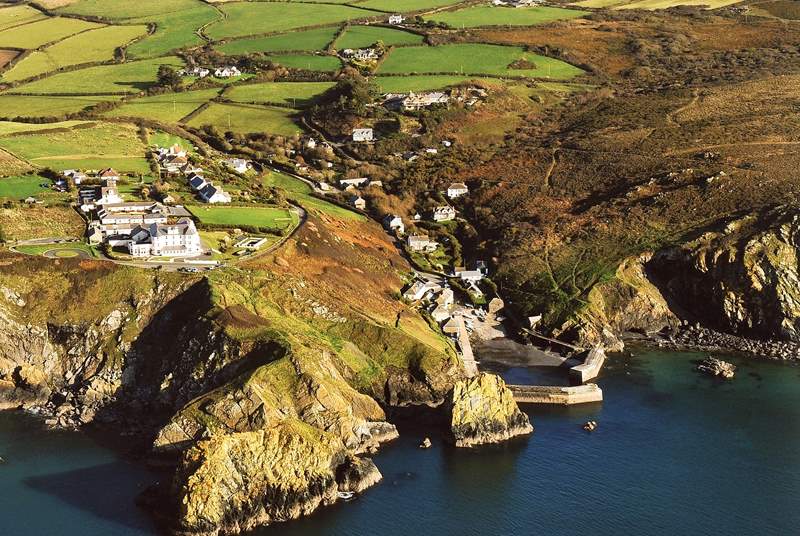 Nantivet is the last but one property at the far end of a private lane, set back from the Mullion Cove Hotel (at the far end of the second row of houses in from the left, in the photograph).