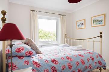 Pretty floral materials compliment the neutral colours.