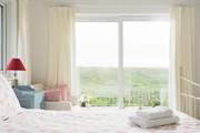 Open up the patio doors from the master bedroom, and listen to the sea from the comfort of your bed.