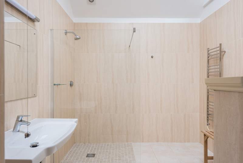 Light and spacious, the gorgeous wet-room is beautifully finished.