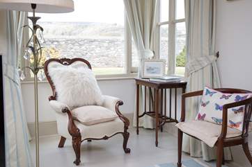 A great spot in the sitting-room to relax and read the paper.