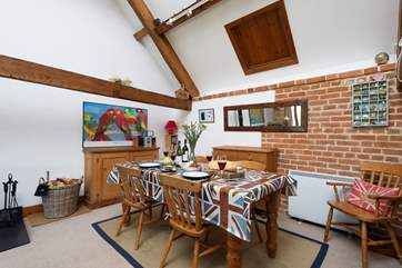 There is a lovely farmhouse dining-table - plenty of seating if your party books Flax Barn too.