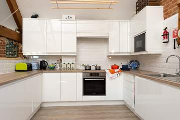 The new kitchen balances perfectly with the traditional style of this lovely welcoming property.