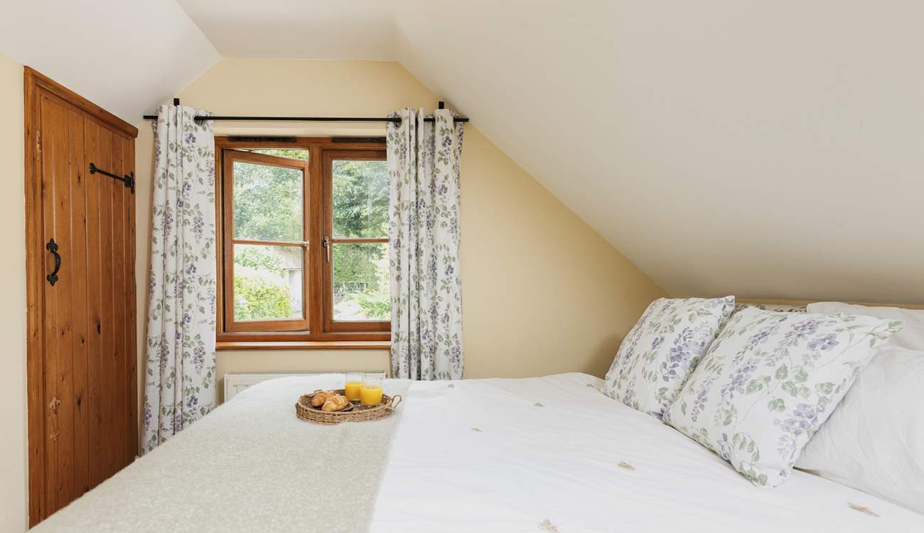 Bedroom 2, the double bedroom, overlooks the secluded garden.