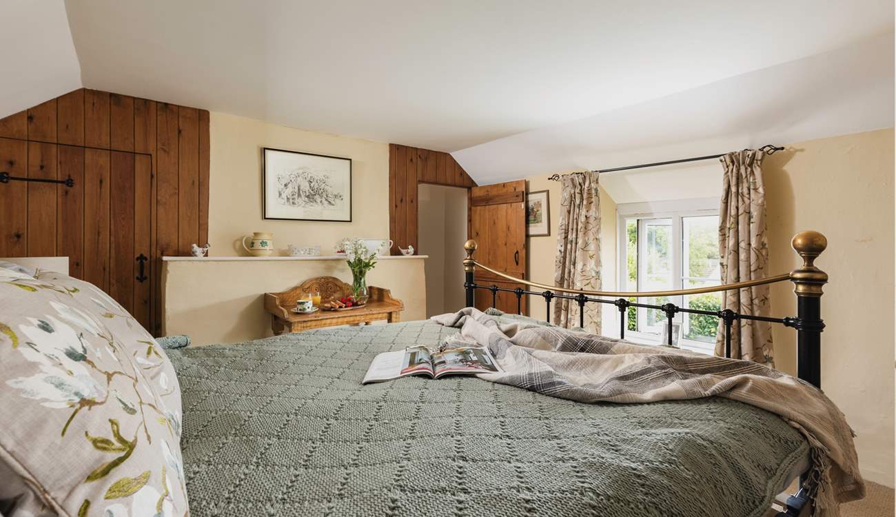 The en suite for the main bedroom (Bedroom 1) is through the door in the far corner.