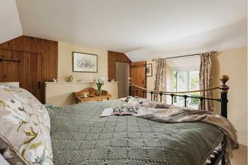 The en suite for the master bedroom (Bedroom 1) is through the door in the far corner.