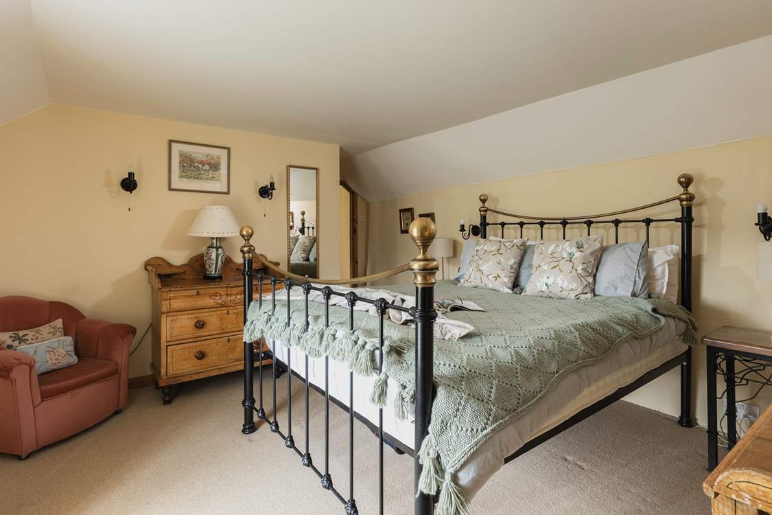 Bedroom 1, the main bedroom, is beautifully furnished.