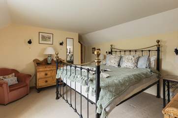 Bedroom 1, the master bedroom, is beautifully furnished.