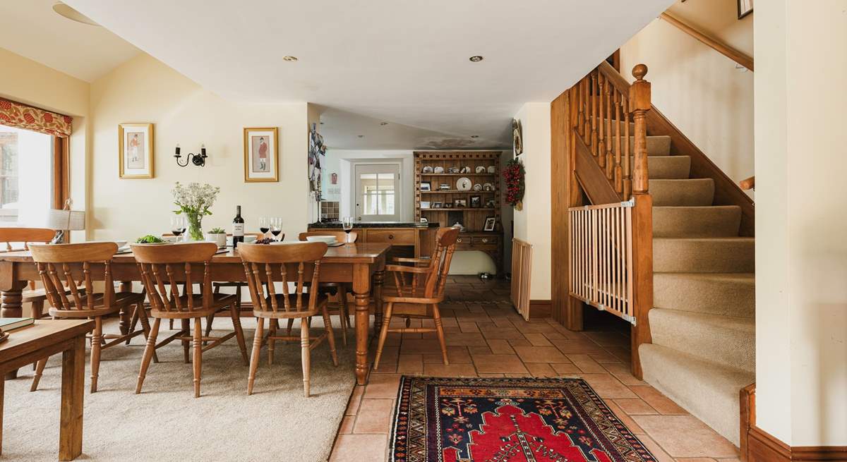 Stairs lead from the open plan living-area to the bedrooms and bathroom on the first floor.