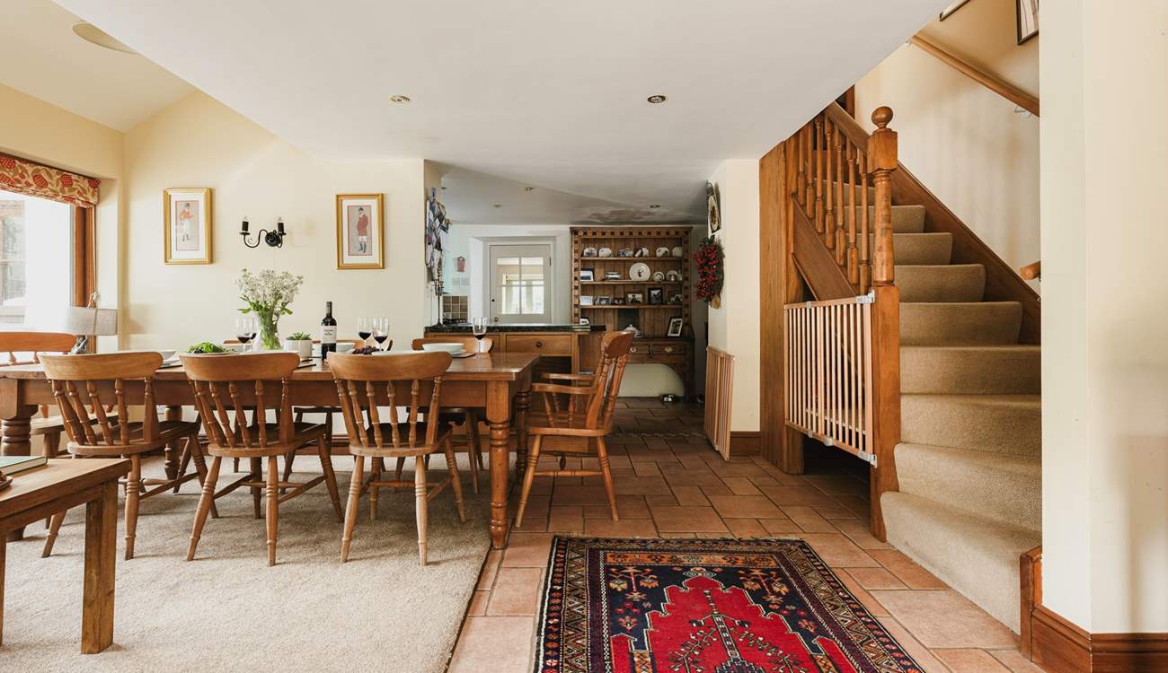 Stairs lead from the open plan living-area to the bedrooms and bathroom on the first floor.