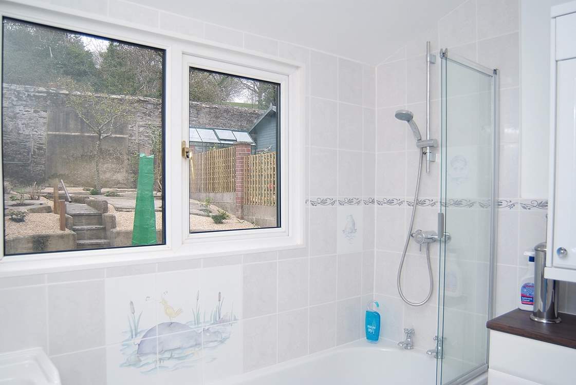 The modern bathroom (there is also a separate cloakroom next door).