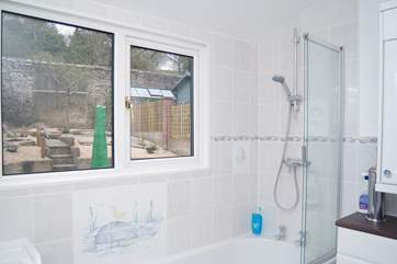 The modern bathroom (there is also a separate cloakroom next door).