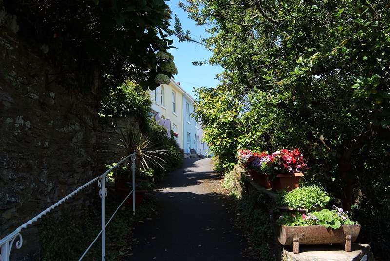 The path up from the road to the row of cottages.