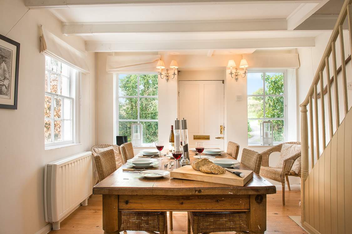 The stairs lead up from the dining-area to the bedrooms.