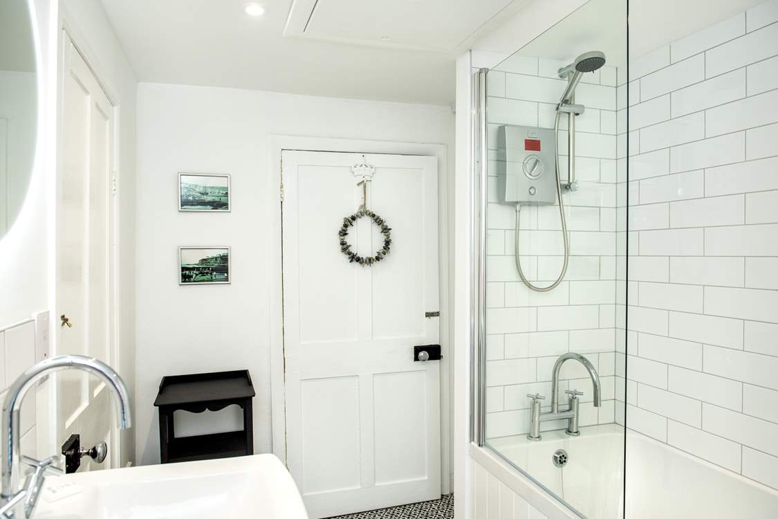 The cottage has a stylish bathroom.