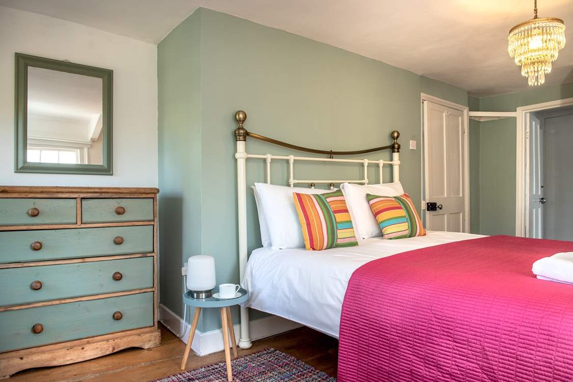 The double bedroom has a lovely bedstead.