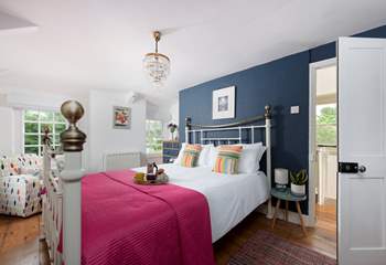 The principal bedroom (1) has a rather gorgeous king-size bed.