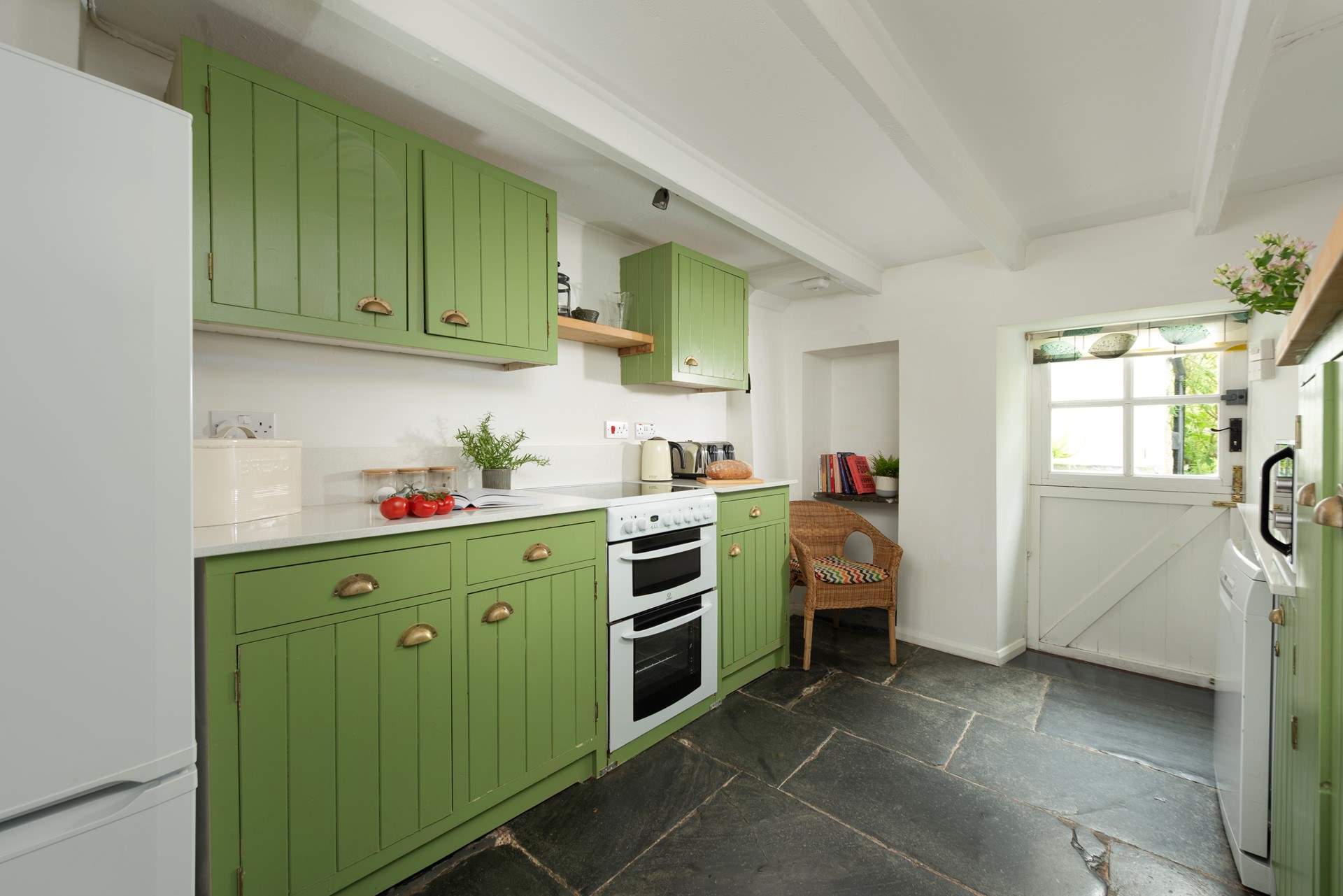 A beautiful slate flagstone floor in this charming cottage kitchen.