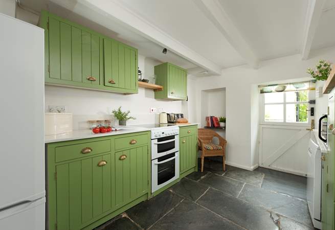 A beautiful slate flagstone floor in this charming cottage kitchen.