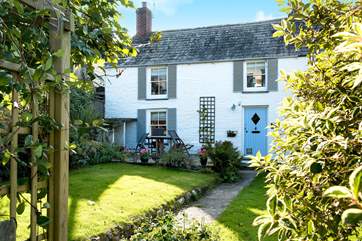 The garden path leads you to the delightful Court Cottage.