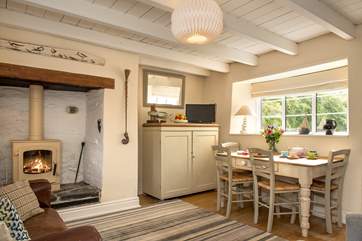 The open plan living-area has a toasty wood-burner making this an ideal retreat whatever the weather.