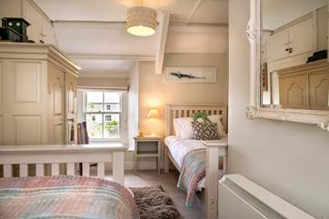 The pretty twin bedroom.