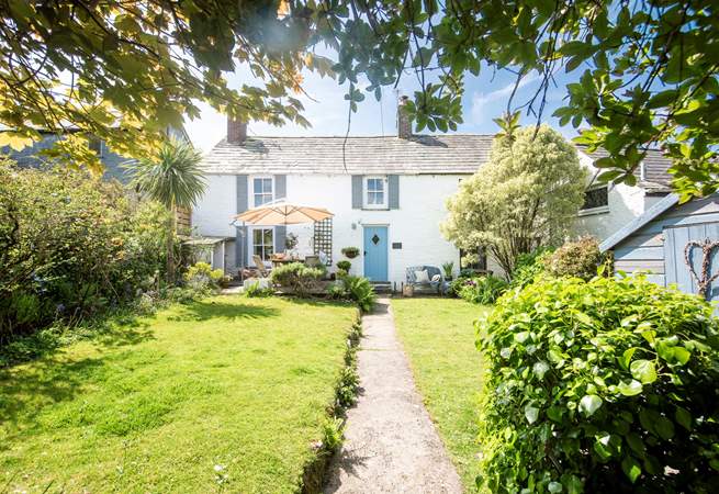 The garden path leads you to the delightful Court Cottage.