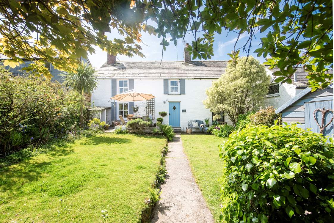The garden path leads you to the delightful Court Cottage.