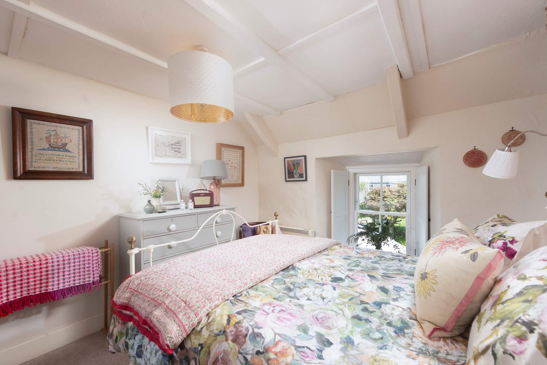 The double aspect master bedroom.