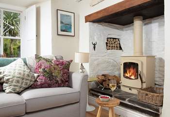 The open plan living-area has a toasty wood-burner making this an ideal retreat whatever the weather.