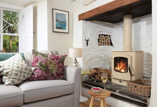 The open plan living-area has a toasty wood-burner making this an ideal retreat whatever the weather.