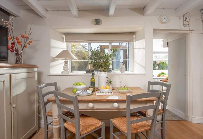 The kitchen leads off from the dining area.