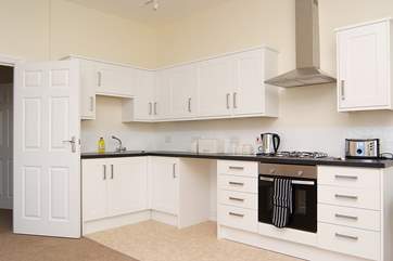 The well-equipped modern kitchen in the open plan living-area.