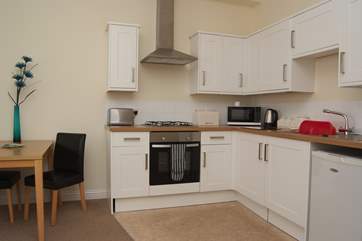 The kitchen and dining-area.