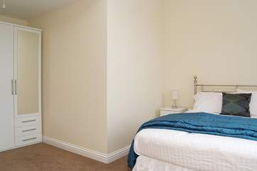 The spacious bedroom.