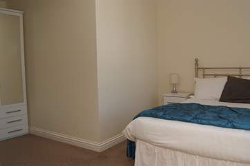 The spacious bedroom.