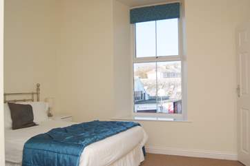 The spacious bedroom.