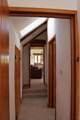 There are two steps from the living-room down to the bedrooms and bathroom.